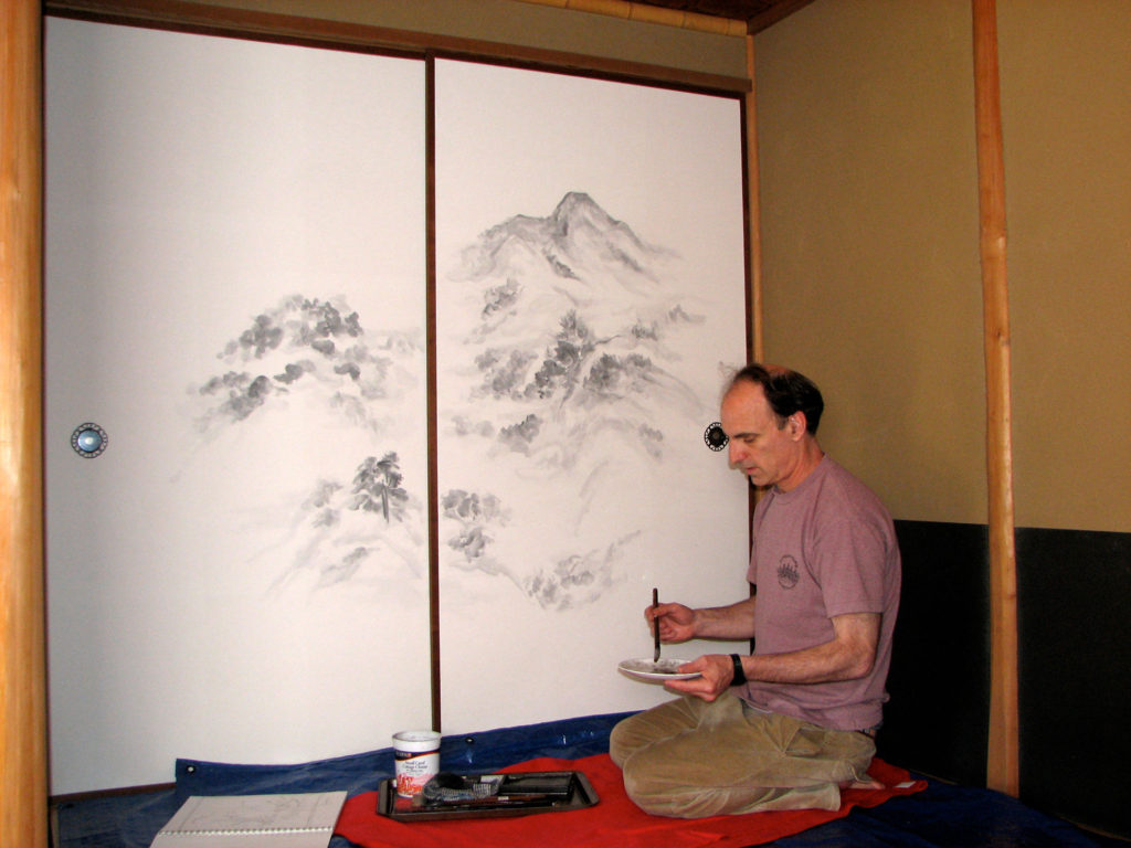 Michael Hofmann painting fusuma screens at Green Gulch Zen Center, Muir Beach, California